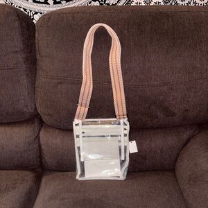 Clear purse with brown straps